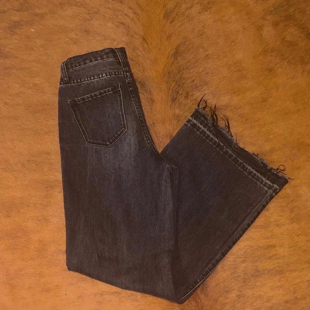 Vibrant Black High Rise Distressed Jeans size 25